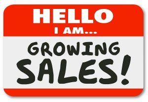 Hello I am Growing Sales words on a nametag sticker for greeting or introduction of a productive sales person with great ambition to succeed and sell to more customers